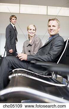 Stock Photograph - businesspeople 
in waiting area. 
fotosearch - search 
stock photos, 
pictures, images, 
and photo clipart