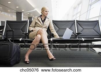 Stock Photo - businesswoman 
looking at laptop. 
fotosearch - search 
stock photos, 
pictures, images, 
and photo clipart