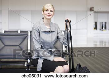 Stock Photography - businesswoman 
next to suitcase. 
fotosearch - search 
stock photos, 
pictures, images, 
and photo clipart