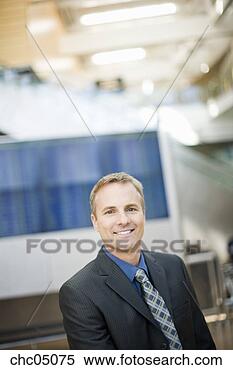 Stock Image - close up of businessman 
indoors. fotosearch 
- search stock 
photos, pictures, 
images, and photo 
clipart