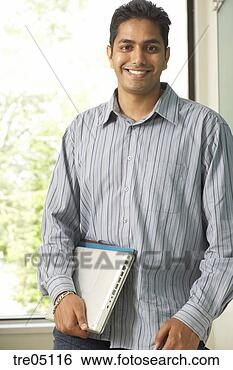 Stock Photo - indian male student 
leaning on chalkboard. 
fotosearch - search 
stock photos, 
pictures, images, 
and photo clipart
