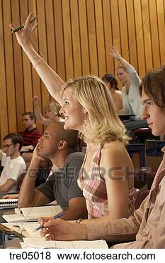 Stock Photo - student with raised 
hand in auditorium. 
fotosearch - search 
stock photos, 
pictures, images, 
and photo clipart