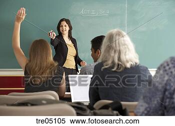 Stock Image - teacher pointing 
eraser at student. 
fotosearch - search 
stock photos, 
pictures, images, 
and photo clipart