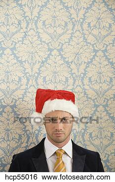 Stock Photo - angry man in santa 
hat. fotosearch 
- search stock 
photos, pictures, 
images, and photo 
clipart