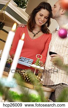 Stock Photograph - couple drinking 
wine and setting 
out food. fotosearch 
- search stock 
photos, pictures, 
images, and photo 
clipart