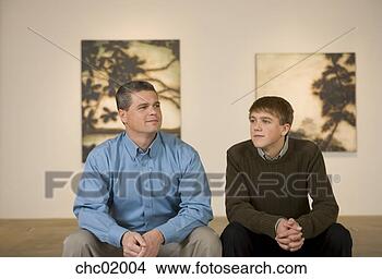 Stock Photo - father and son 
in art gallery. 
fotosearch - search 
stock photos, 
pictures, images, 
and photo clipart