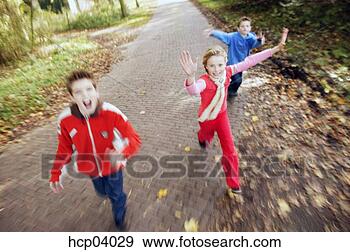 Stock Photograph - children running 
outside. fotosearch 
- search stock 
photos, pictures, 
images, and photo 
clipart