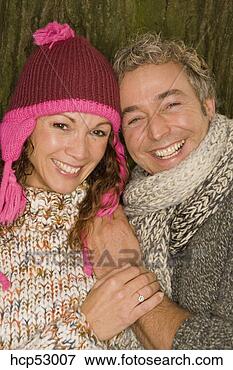Picture - couple wearing 
knit clothing. 
fotosearch - search 
stock photos, 
pictures, images, 
and photo clipart