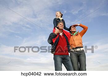 Stock Photo - family looking 
out. fotosearch 
- search stock 
photos, pictures, 
images, and photo 
clipart