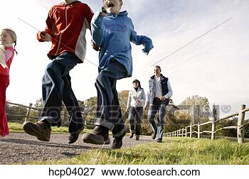 Picture - family running 
outside. fotosearch 
- search stock 
photos, pictures, 
images, and photo 
clipart