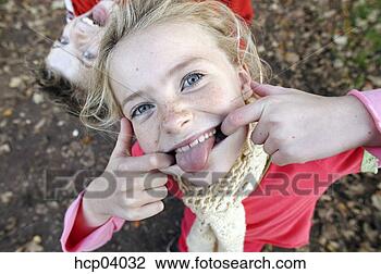 Stock Photo - girl making a 
face. fotosearch 
- search stock 
photos, pictures, 
images, and photo 
clipart