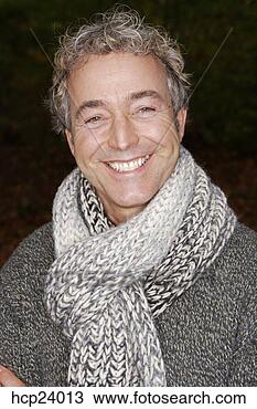 Stock Photo - middle aged man 
with scarf smiling. 
fotosearch - search 
stock photos, 
pictures, images, 
and photo clipart