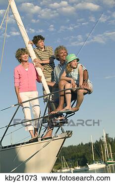 Stock Photo - family smiling 
on boat. fotosearch 
- search stock 
photos, pictures, 
images, and photo 
clipart