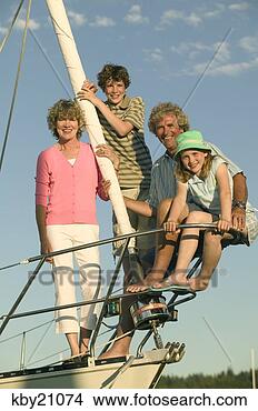 Stock Photo - family smiling 
on boat. fotosearch 
- search stock 
photos, pictures, 
images, and photo 
clipart