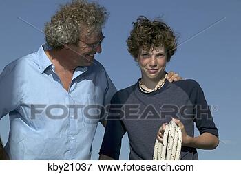 Picture - father and son 
manning boat. 
fotosearch - search 
stock photos, 
pictures, images, 
and photo clipart