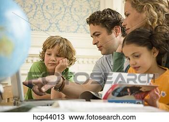 Stock Photo - family reading 
together. fotosearch 
- search stock 
photos, pictures, 
images, and photo 
clipart