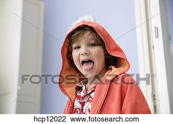 Stock Photo - young boy making 
a face. fotosearch 
- search stock 
photos, pictures, 
images, and photo 
clipart