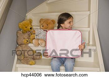 Stock Photo - young girl playing 
with teddy bears. 
fotosearch - search 
stock photos, 
pictures, images, 
and photo clipart