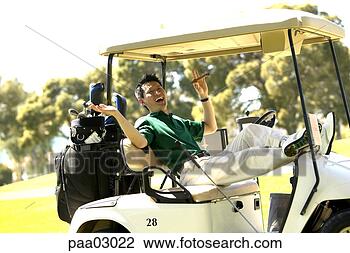 Stock Photo - asian man relaxing 
with cigar in 
golf cart. fotosearch 
- search stock 
photos, pictures, 
images, and photo 
clipart