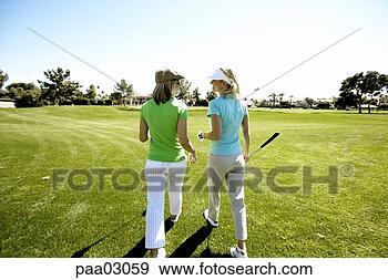 Stock Photograph - female golfers. 
fotosearch - search 
stock photos, 
pictures, images, 
and photo clipart