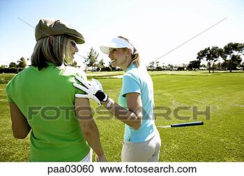 Stock Photography - female golfers. 
fotosearch - search 
stock photos, 
pictures, images, 
and photo clipart