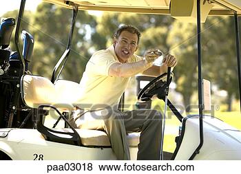 Stock Photo - man driving golf 
cart. fotosearch 
- search stock 
photos, pictures, 
images, and photo 
clipart