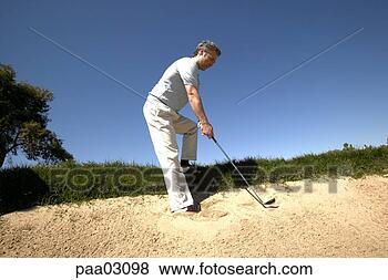 man-hitting-golf_~paa03098.jpg