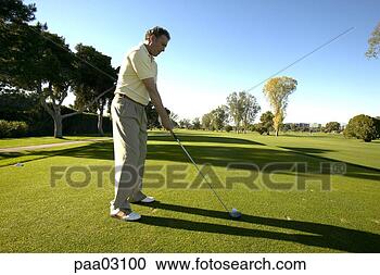 Stock Photography - man hitting golf 
ball out of bunker. 
fotosearch - search 
stock photos, 
pictures, images, 
and photo clipart