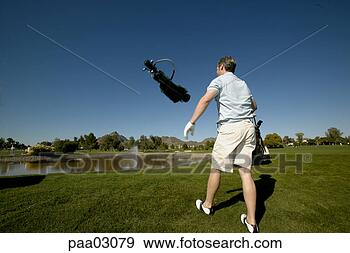 Stock Photograph - man throwing golf 
cart into lake. 
fotosearch - search 
stock photos, 
pictures, images, 
and photo clipart