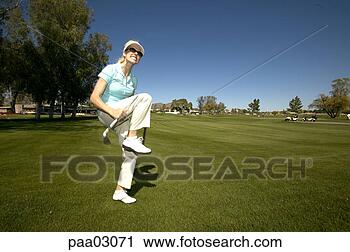 Stock Photography - woman breaking 
golf club in half. 
fotosearch - search 
stock photos, 
pictures, images, 
and photo clipart