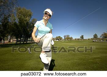 Stock Photo - woman breaking 
golf club in half. 
fotosearch - search 
stock photos, 
pictures, images, 
and photo clipart