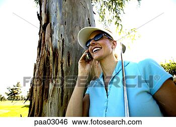 Stock Photo - woman talking 
on cell phone. 
fotosearch - search 
stock photos, 
pictures, images, 
and photo clipart