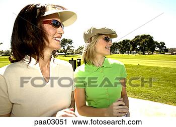 Stock Photography - women on golf 
course. fotosearch 
- search stock 
photos, pictures, 
images, and photo 
clipart