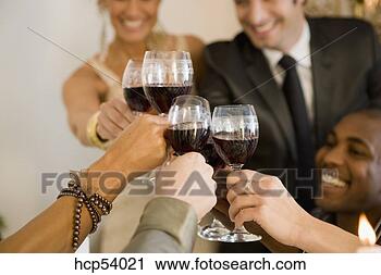 Stock Photography - friends toasting 
each other with 
wine. fotosearch 
- search stock 
photos, pictures, 
images, and photo 
clipart