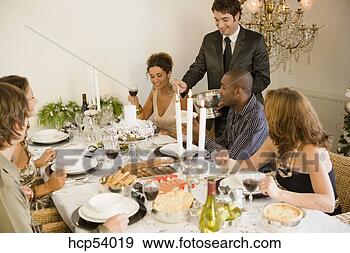 Stock Photograph - man serving soup 
at dinner table. 
fotosearch - search 
stock photos, 
pictures, images, 
and photo clipart