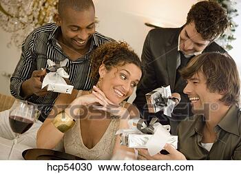 Stock Photography - men offering woman 
gifts. fotosearch 
- search stock 
photos, pictures, 
images, and photo 
clipart