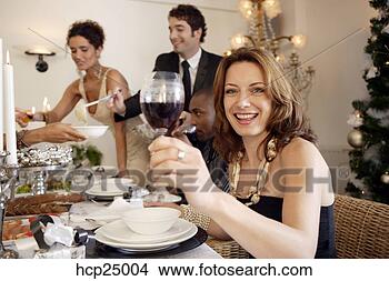 Banco de Imagem - mulher,  bebendo, 
 vinho,  jantar, 
 partido. fotosearch 
- busca de fotos, 
imagens e clipart