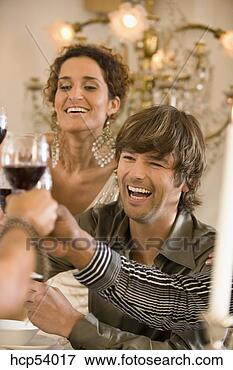 Picture - people toasting 
each other. fotosearch 
- search stock 
photos, pictures, 
images, and photo 
clipart