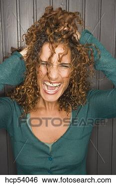 Stock Photo - screaming woman 
pulling at her 
hair. fotosearch 
- search stock 
photos, pictures, 
images, and photo 
clipart