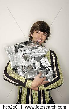 Stock Photography - smiling man holding 
christmas gifts. 
fotosearch - search 
stock photos, 
pictures, images, 
and photo clipart