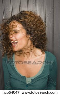 Picture - woman shaking 
her hair. fotosearch 
- search stock 
photos, pictures, 
images, and photo 
clipart