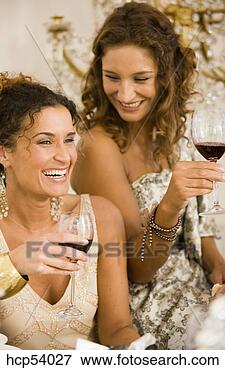 Picture - women having wine 
together. fotosearch 
- search stock 
photos, pictures, 
images, and photo 
clipart