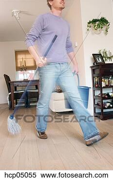 Stock Image - blurred man mopping 
floor. fotosearch 
- search stock 
photos, pictures, 
images, and photo 
clipart