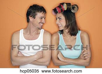 Stock Image - couple giggling 
at each other. 
fotosearch - search 
stock photos, 
pictures, images, 
and photo clipart