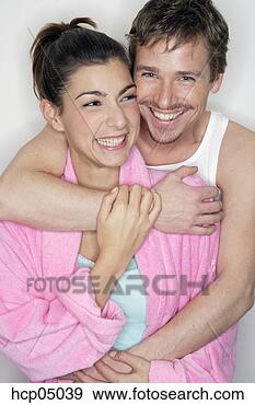 Stock Photograph - couple hugging. 
fotosearch - search 
stock photos, 
pictures, images, 
and photo clipart