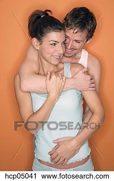 Stock Photography - couple hugging. 
fotosearch - search 
stock photos, 
pictures, images, 
and photo clipart