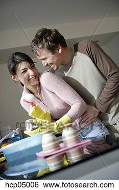 Stock Photo - couple playing 
while washing 
dishes. fotosearch 
- search stock 
photos, pictures, 
images, and photo 
clipart