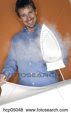 Stock Photo - man ironing clothes. 
fotosearch - search 
stock photos, 
pictures, images, 
and photo clipart