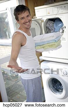 Picture - man doing laundry. 
fotosearch - search 
stock photos, 
pictures, images, 
and photo clipart