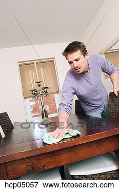 Picture - man wiping table. 
fotosearch - search 
stock photos, 
pictures, images, 
and photo clipart